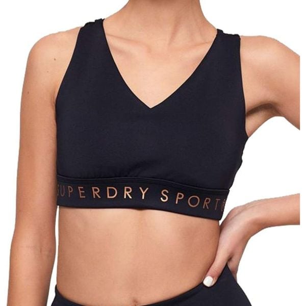 Top sportowy damski Superdry Active Studio. Niebieskie biustonosze sportowe damskie Superdry, bez wzorów. W wyprzedaży za 112.00 zł.