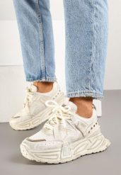 Beżowe Sneakersy na Grubej Podeszwie z Tłoczeniem i Nitami Eraviellea. Brązowe obuwie sportowe damskie Born2be, z jeansu, bez zapięcia. Za 119.99 zł.