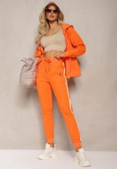 Pomarańczowe Spodnie Dresowe High Waist z Lampasami Skadia. Brązowe spodnie dresowe damskie Renee, bez wzorów, z dresówki. Za 34.99 zł.