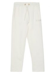 Guess Spodnie dresowe J5YQ17 KAV34 Écru Regular Fit. Spodnie dresowe dziewczęce Guess, z aplikacjami, z bawełny. Za 139.99 zł.
