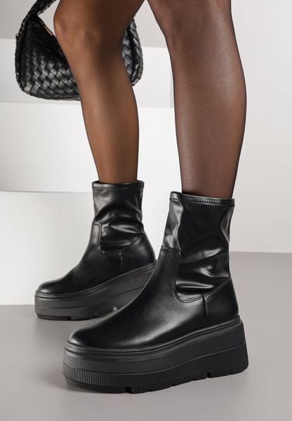 Czarne Botki Vices w Stylu Tech Gothic na Platformie Niorna. Czarne botki damskie Renee, z koronki, bez obcasa, na platformie, bez zapięcia. Za 109.99 zł.