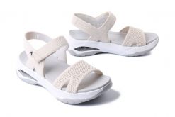 RIEKER W3152-60 beige, sandały damskie. Brązowe sandały damskie Rieker, bez wzorów, z materiału, bez obcasa, na płaskiej podeszwie, bez zapięcia. Za 251.93 zł.