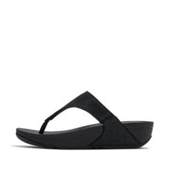 Klapki między palcami damskie FitFlop Lulu Shimmerglitz. Czarne klapki damskie FIT FLOP, bez wzorów, bez obcasa, bez zapięcia. Za 443.50 zł.
