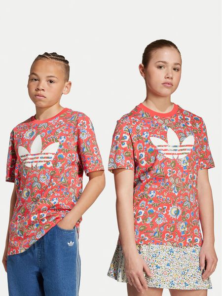 Adidas T-Shirt Liberty London JV7817 Czerwony Loose Fit. Czerwone koszulki i t-shirty dziewczęce Adidas, bez wzorów, z bawełny, bez kołnierzyka, bez ramiączek. Za 99.99 zł.