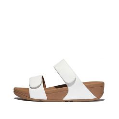 Kobiece skórzane sandały na koturnie z regulacją FitFlop Lulu. Białe sandały damskie FIT FLOP, bez wzorów, z materiału, bez obcasa, na koturnie, bez zapięcia. Za 493.50 zł.