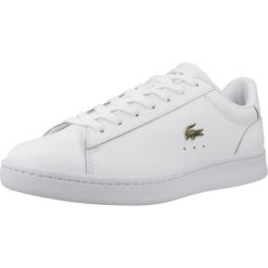 Tenisówki Lacoste Model Carnaby Kolor Biały. Białe obuwie sportowe damskie Lacoste, ze skóry, bez zapięcia, tenisowe. Za 389.99 zł.