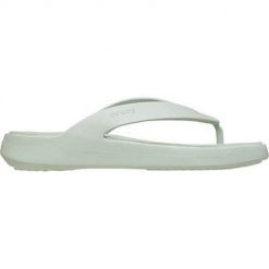 Japonki damskie Crocs C4615. Zielone klapki damskie Crocs, bez wzorów, z materiału, bez obcasa, bez zapięcia. Za 179.00 zł.