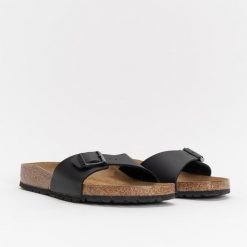 Birkenstock Madrid BS Klapki damskie. Czarne klapki damskie Birkenstock, bez wzorów, bez obcasa, bez zapięcia. Za 319.99 zł.