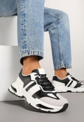 Czarno-Białe Sneakersy w Streetwearowym Stylu z Ozdobnymi Przeszyciami Isallena. Czarne obuwie sportowe damskie Renee, bez zapięcia. Za 99.99 zł.