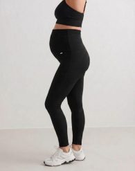 Damskie legginsy ciążowe prążkowane, bezszwowe Ribbed Seamless czarne. Czarne legginsy sportowe damskie Aim'n, m, bez wzorów, z dzianiny, z podwyższonym stanem, na fitness i siłownię. Za 258.00 zł.