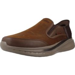 Buty SKECHERS SLADE - COOPER SLIP-INS Brązowy. Brązowe obuwie sportowe damskie Skechers, bez zapięcia, trekkingowe, Skechers Sport. Za 449.32 zł.