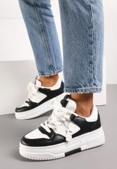 Biało-Czarne Sneakersy na Grubej Podeszwie z Perforacją z Gumową Odczepianą Ozdobą Faer. Białe obuwie sportowe damskie Born2be, z gumy, bez zapięcia. Za 99.99 zł.