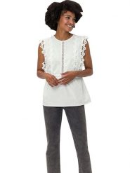 Heine Bluzka w kolorze kremowym rozmiar: 46. Brązowe bluzki damskie Heine, bez wzorów, z koronki, bez kołnierzyka, bez ramiączek. Za 108.74 zł.