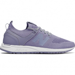 New Balance WRL247SS. Niebieskie obuwie sportowe damskie New Balance, z materiału. W wyprzedaży za 199.99 zł.