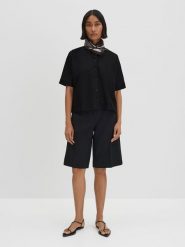 Someday Bluzka "Zunya" w kolorze czarnym rozmiar: M. Czarne bluzki damskie someday., m, bez wzorów, bez kołnierzyka, bez ramiączek. Za 173.99 zł.