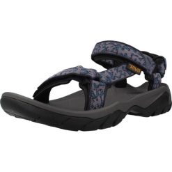 Sandały TEVA W TERRA FI 5 UNI Wielokolorowy. Sandały damskie Teva, bez wzorów, z tkaniny, bez obcasa, bez zapięcia. Za 381.99 zł.