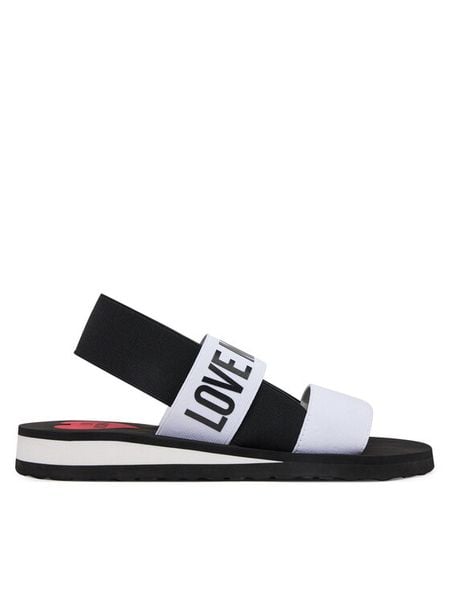 LOVE MOSCHINO Sandały JA16033G0MJN410A Biały. Białe sandały damskie Love Moschino, bez wzorów, z materiału, bez obcasa, na płaskiej podeszwie, bez zapięcia. Za 329.99 zł.