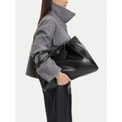 Torebka JENNY. Czarne shopper bag Jenny, bez dodatków. Za 159.99 zł.