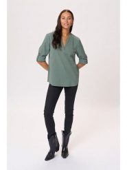 Kaffe Bluzka w kolorze turkusowym rozmiar: 40. Niebieskie bluzki damskie Kaffe, bez wzorów, z bawełny, bez kołnierzyka, bez ramiączek. Za 82.44 zł.