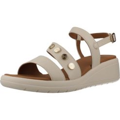 Sandały GEOX D MELICONIA Beżowy. Brązowe sandały damskie Geox, bez wzorów, z syntetyku, bez obcasa, bez zapięcia. Za 365.99 zł.