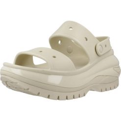 Klapki Crocs Model Classic Mega Crush Sandal Kolor Beżowy. Brązowe klapki damskie Crocs, bez wzorów, z gumy, bez obcasa, bez zapięcia. Za 394.00 zł.