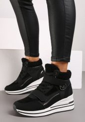 Czarne Sznurowane Sneakersy na Koturnie ze Sztucznym Futrem i Metalicznymi Aplikacjami Leridras. Czarne obuwie sportowe damskie Born2be, z materiału, bez zapięcia. Za 129.99 zł.