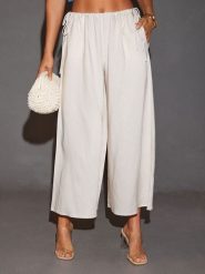 LA Angels Spodnie w kolorze kremowym rozmiar: S. Brązowe spodnie materiałowe damskie LA Angels, bez wzorów, z materiału. Za 126.99 zł.