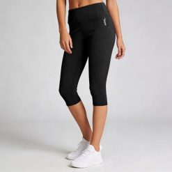 Legginsy Softee Impulse Capri w kolorze czarnym. Czarne legginsy damskie Softee, m, bez wzorów, z elastanu. Za 167.99 zł.