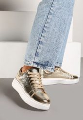 Złote Metaliczne Sneakersy Vices na Płaskiej Podeszwie Syliel. Żółte obuwie sportowe damskie Renee, bez zapięcia. Za 69.99 zł.