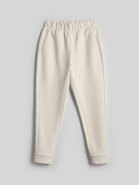 4F Spodnie dresowe joggery damskie - kremowe M. Białe spodnie dresowe damskie 4F, m, bez wzorów, z dresówki. Za 149.99 zł.