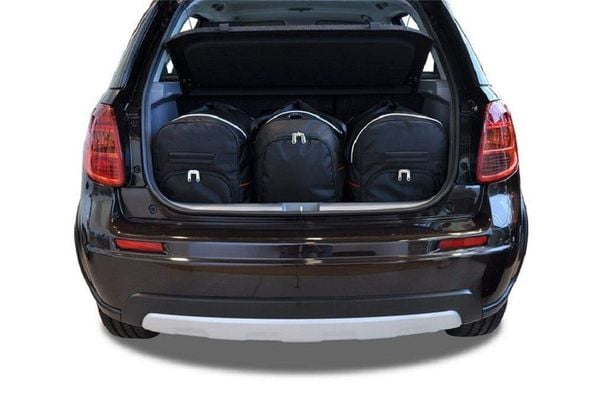 Torby Do Bagażnika Suzuki Sx4 S-Cross 2006-2013 3Szt Kjust. Czarne torby podróżne KJUST, bez wzorów, z kauczuku. Za 944.00 zł.