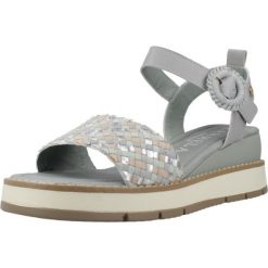 Sandały CARMELA 163155C Niebieski. Niebieskie sandały damskie Carmela, bez wzorów, ze skóry, bez obcasa, bez zapięcia. Za 353.99 zł.