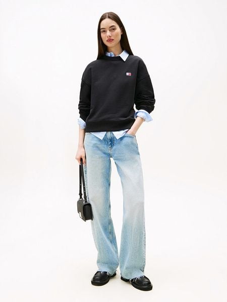 TOMMY JEANS Bluza w kolorze czarnym rozmiar: M. Czarne bluzy damskie Tommy Jeans, m, bez wzorów, z bawełny, bez kaptura. Za 242.13 zł.