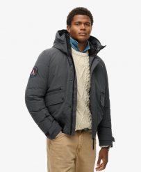 Superdry City Padded Bomber Kurtka pikowana – luźny fason. Brązowe kurtki damskie Superdry, xl, z aplikacjami, z materiału, z kapturem. Za 707.50 zł.