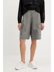 Adidas Bermudy dżinsowe - Loose fit - w kolorze szarym rozmiar: 36. Szare szorty damskie Adidas, bez wzorów, z bawełny, z podwyższonym stanem. Za 161.95 zł.
