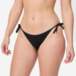 Dół kostiumu kąpielowego surfingowego damski Olaian Sofy. Czarne bikini OLAIAN, bez wzorów, z elastanu. Za 19.99 zł.