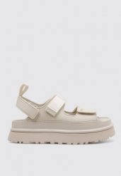 Sandały Ugg Australian W Złotym Świecie Damskie. Białe sandały damskie Ugg, bez wzorów, z materiału, bez obcasa, na platformie, bez zapięcia. Za 523.99 zł.