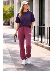 Adidas Koszulka w kolorze fioletowym rozmiar: XL. Różowe bluzki damskie Adidas, xl, bez wzorów, z bawełny, bez kołnierzyka, bez ramiączek. Za 114.44 zł.