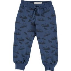 Spodnie w kolorze niebieskim. Niebieskie spodnie niemowlęce Name it. W wyprzedaży za 49.95 zł.