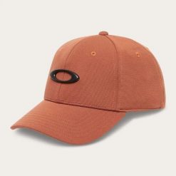 Czapka z daszkiem Oakley TINCAN FOS911545-44N. Brązowe czapki z daszkiem damskie Oakley, na lato, bez wzorów, z elastanu. Za 105.34 zł.