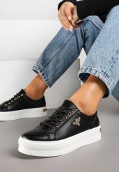 Biało-Czarne Skórzane Sneakersy na Grubej Podeszwie z Przeszyciami i Broszką Nirnile. Białe obuwie sportowe damskie Renee, bez zapięcia. Za 159.99 zł.
