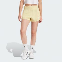 Szorty Pacer Essentials Knit High-Rise. Czarne obuwie sportowe damskie Adidas, z materiału, bez zapięcia, na fitness i siłownię. Za 139.00 zł.