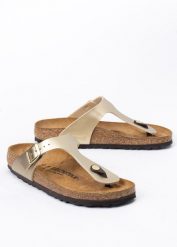 BIRKENSTOCK GIZEH BF Klapki damskie. Żółte klapki damskie Birkenstock, bez wzorów, z materiału, bez obcasa, bez zapięcia. Za 349.99 zł.