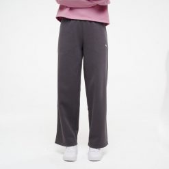 Spodnie dresowe damskie Puma Gym & Pilates. Czarne spodnie dresowe damskie Puma, bez wzorów, z bawełny. Za 129.99 zł.