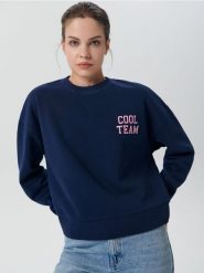 Bluza z nadrukiem - granatowy. Niebieskie bluzy damskie Sinsay, l, bez wzorów, z bawełny, bez kaptura. W wyprzedaży za 29.99 zł.