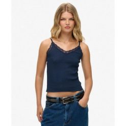 Koszulka z koronkowym wykończeniem. Niebieskie koszulki damskie Superdry, bez wzorów, z koronki, bez kołnierzyka, bez ramiączek. Za 104.05 zł.