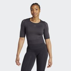 Koszulka Aeroknit. Czarne bluzki damskie Adidas, l, bez wzorów, z materiału, bez kołnierzyka, bez ramiączek. Za 179.00 zł.