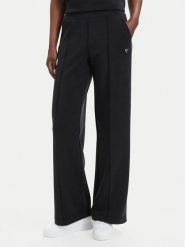 Guess Spodnie dresowe V6YB18 K4315 Czarny Regular Fit. Czarne spodnie dresowe damskie Guess, s, z aplikacjami, z dresówki. Za 394.99 zł.