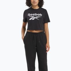 Koszulka Reebok Identity Big Logo Crop Tee. Czarne koszulki damskie REEBOK FITNESS, bez wzorów, bez kołnierzyka, bez ramiączek. Za 59.99 zł.