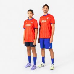 Koszulka piłkarska dla kibiców Serbia 2026. Czerwone bluzki damskie KIPSTA, s, bez wzorów, z materiału, sportowe, bez kołnierzyka, bez ramiączek. Za 44.99 zł.